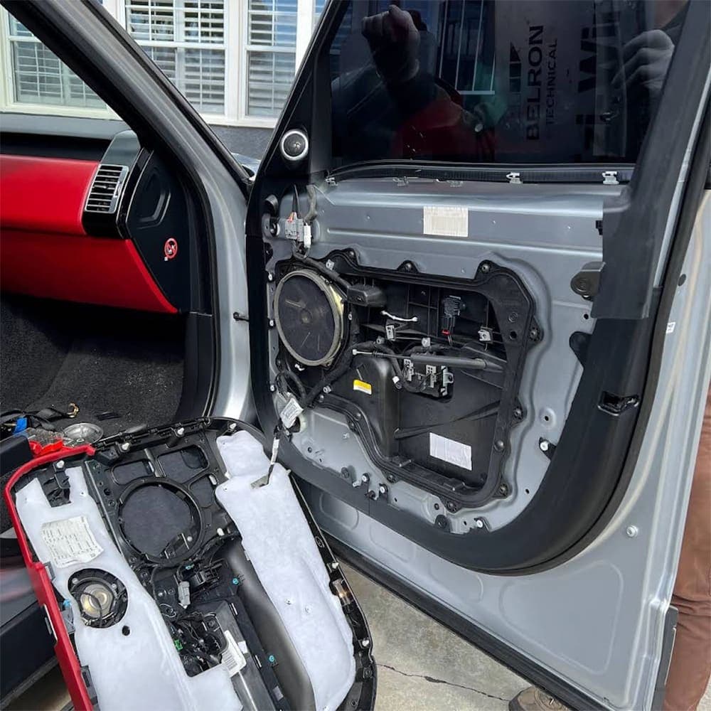 Crystal Clear Auto Glass technician finishing a job